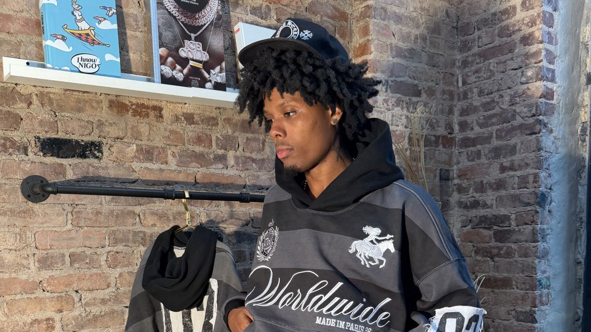 Model in the Shadow Black Gouge Worldwide rugby hoodie